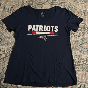 The Nike tee women’s size medium patriots football T-shirt, navy blue